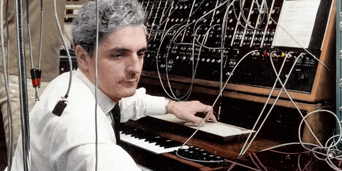 A Colorized Version of Robert Moog playing a Moog Synthesizer